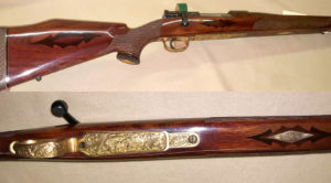 Early FN .300 custom. Engraved barrel and receiver as standard. Gold bottom metal with a whitetail deer. Very rare piece from the 50's. $POR